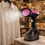 Défroisseur vapeur rose Lexical LHH-0930 1600 W défroissant une chemise sur cintre - 99 DT