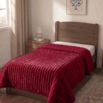 Couverture ABM 160x220 cm acrylique gaufree coloris Rouge bordeaux sur un lit une place